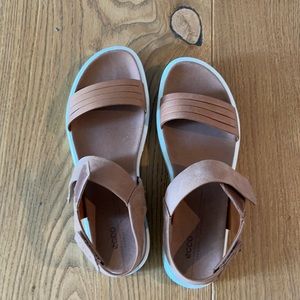 Ecco sandals. Tan with a white bottom.